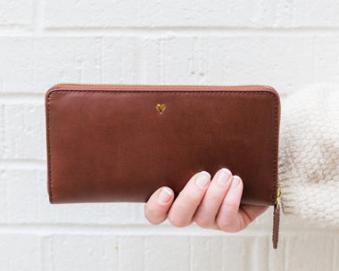 Full grain leather wallet with a gold heart monogram