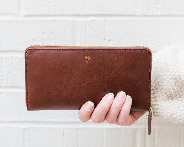 Full grain leather wallet with a gold heart monogram